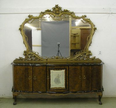 Italian Art Deco buffet: A 1930's period Italian Art Deco buffet. Carved glided mirror over a Burl Walnut base with shaped inset glass top, and 5 shaped lower doors, the central opens to reveal a mirrored bar cabinet with fit