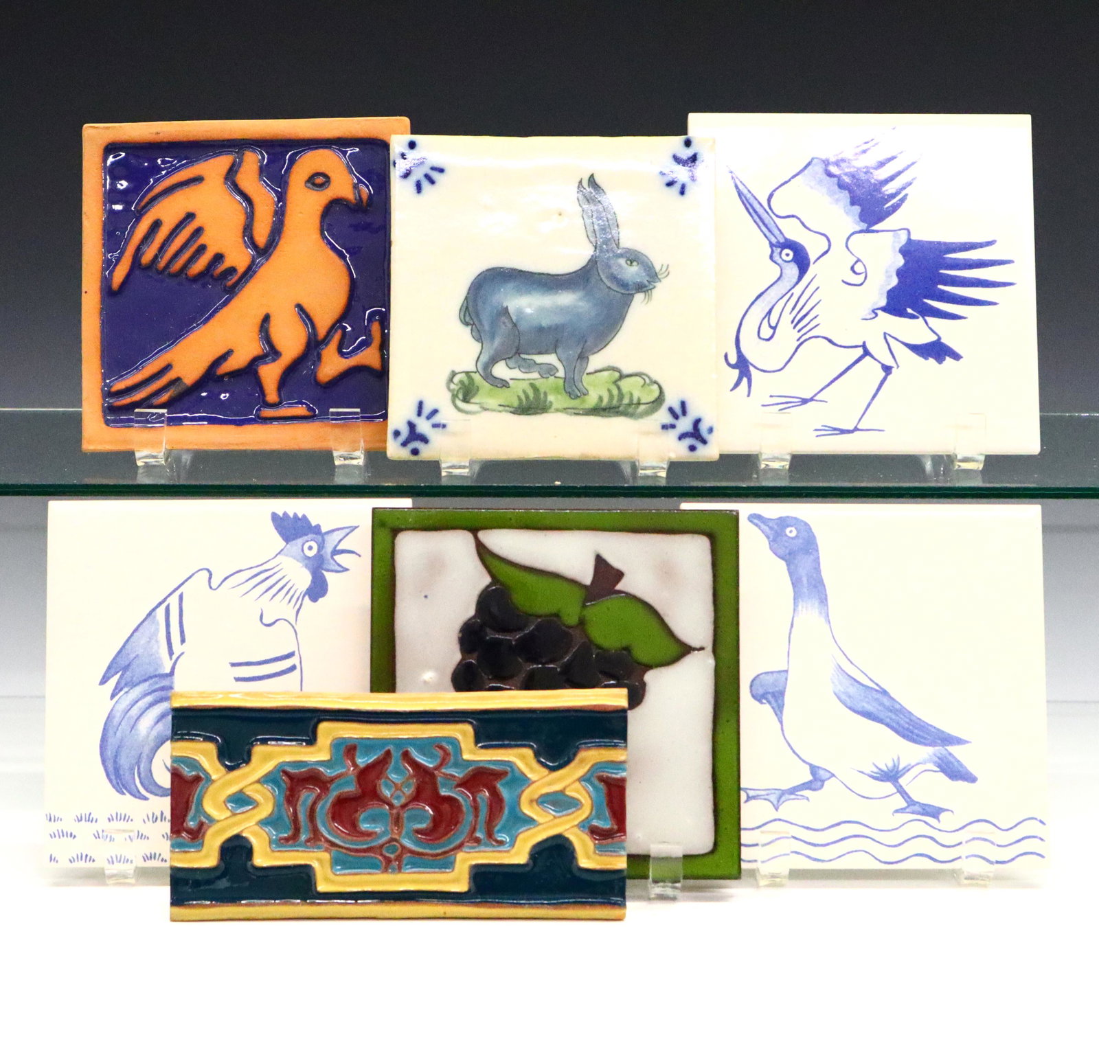 7 Contemporary Century Tiles: Seven Contemporary earthenware Tiles. Including 1 cluster of grapes by Texeramics, 1 reproduction Junior Morgan for Hearst Castle, 1 stylized bird by Deer Creek Pottery (California), 1 tile featuring 