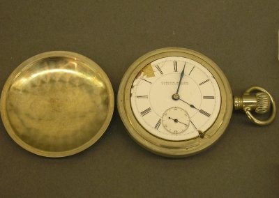 Rockford/Joseph Miller, Ypsilanti pocket watch: A Rockford Watch Co "R W" model pocket watch retailed by Joseph Miller, Ypsilanti, Mich. 18 size 15 jewel lever set movement with cut out exposed escapement in a display back case. Wear, chip on dial.