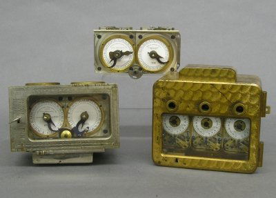 2 Time locks: Two cased bank vault time locks and an additional loose movement. Made by Consolidated, Yale & Towne and the loose movement is by Howard & Co. As found. Up to 5" long. ESTIMATE $200-400