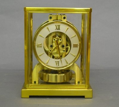 LeCoultre Atmos clock: A LeCoultre Atmos clock. Brass case with perpetual atmospheric time only mechanism. Some case wear. 9" high. ESTIMATE $200-400