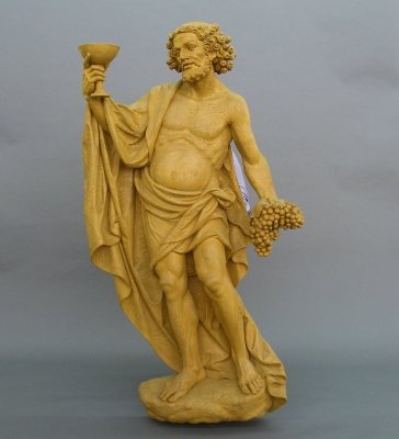 P Vinotti sculpture: P Vinotti, Italian/American 20th century. Hand carved Chestnut figure of Bacchus with grapes and Chalice in hand. Signed "Vinotti. P". Carved by Vinotti for Herman Otto and displayed at the Garland re