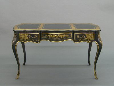 Louis XV Style desk: A mid 20th century Louis XV style bureau plat and matching chair by Drexel. Black painted finish with hand painted decoration, inset leather top and Bronze mounts. Minor wear. 52 1/2 x 26 1/2 x 29 3/4