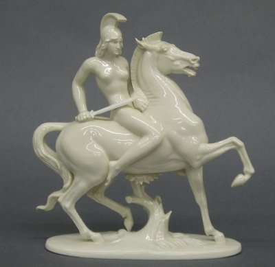 Eschenbach porcelain figure: An early 20th century German porcelain figure of a female equestrian warrior. Modeled by Professor T. Karmer in the Eschenbach factory in Bavaria. Printed and impressed marks. Sword repaired, flake on