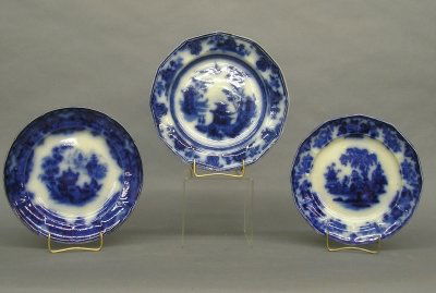 3 Flow Blue plates: Four late 19th century English Flow Blue dinner plates. Various makers and patterns. Wear and some crazing, minor damage. Up to 10 1/2" diameter. ESTIMATE 100-200