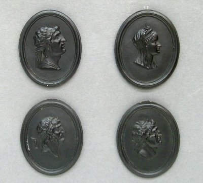 4 Wedgwood & Bentley portrait medallions: Four 18th century English Basalt miniature portrait medallions attributed to Wedgwood & Bentley. Profile portraits of Hellenistic Greek Rulers, including Antiochus, Arsinoe IV (The younger sister of C