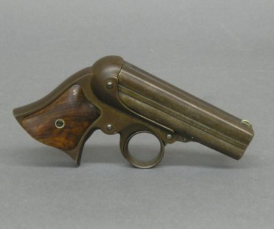Remington "Pepperbox" derringer: A late 19th century Remington-Elliot "Pepperbox" .32 cal RF 4-shot Derringer. Marked "Manufactured By E. Remington & Sons, Ilion N. Y." on left side of barrel, "Elliot's Patent May 29, 1860 - Oct 11, 