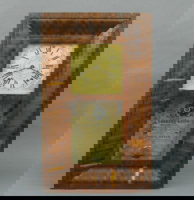 Wm S Sperry & Co. OGEE shelf clock: A 19th century Wm. S. Sperry & Co. OGEE shelf clock. 30 hr weight driven time and strike wooden movement with painted wood dial. Mahogany case with single long door and lower glass. Paper label 80% in