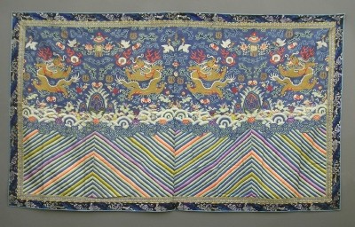 Chinese Embroidered Wall Panel: Mid 19th century Chinese Embroidered Wall Panel, multi colored on a blue background, with four five toed dragon figures floating above clouds and water designs. Additional designs of birds, bats and f