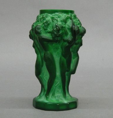 Czech Malachite vase: A 1930's Czech Malachite glass vase with Nudes frolicking below a grape arbor. "Ingrid" line designed by Heinrich Hoffman. Slight wear. 5" high. ESTIMATE $200-400