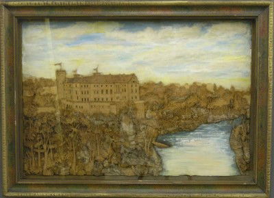 Cork diorama: A turn of the century carved Cork diorama. Features a large castle in a wooded setting at a rivers edge. Hand carved cork with mirrored windows and oil painted background. Minor damage. Framed 30 3/4