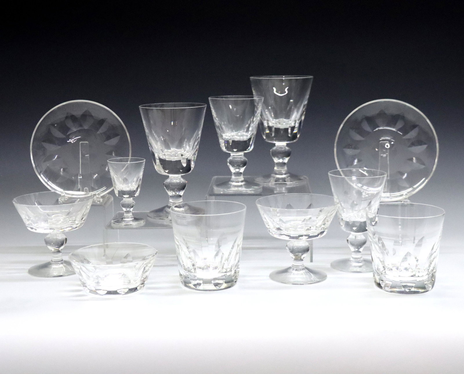 48 pcs St. Louis Jersey Crystal Tableware: Forty-eight pieces of St. Louis "Jersey" pattern Crystal tableware. Includes ten 6" water goblets, eleven 5 1/4" burgundy wine glasses, nine 4" sherbet/champagne glasses, eight 4" double old fashioned