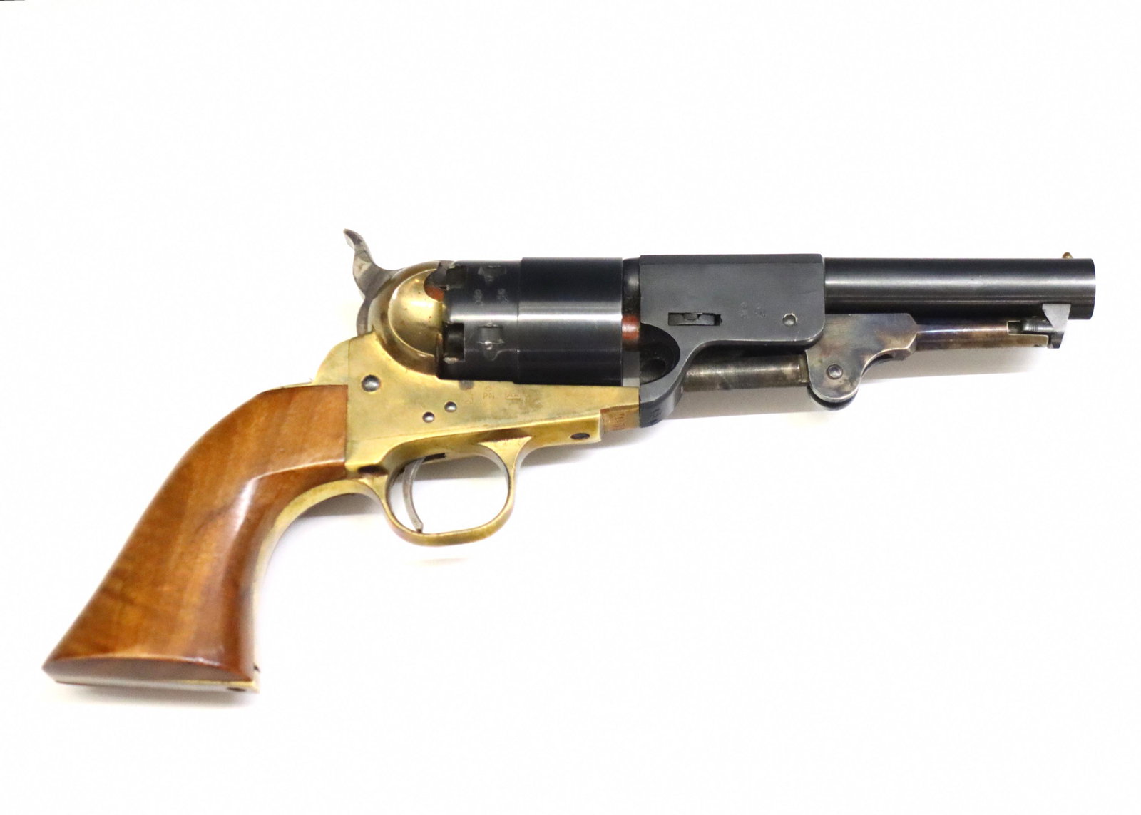 Uberti Replica Navy Arms Revolver: An Uberti replica Navy Arms black powder revolver. .44 caliber, 6 shot, smoothbore 4 7/8" round barrel, with a Walnut grip and Brass frame. Serial #74434 with impressed "434" at top of frame, "Navy Ar