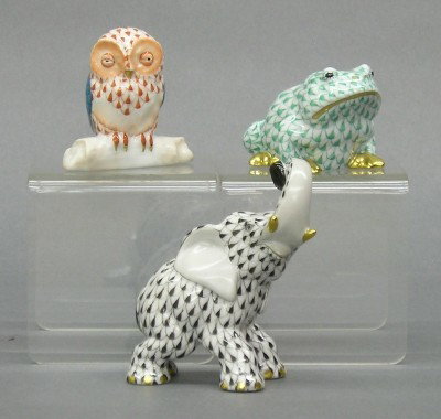 3 Herend porcelain figures: Three 20th century Herend porcelain figures including an elephant, a toad and an owl. All with hand painted "Fishnet" decoration. Printed and impressed marks #94, #213 and #205. Slight wear. Up to 3 1