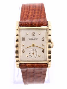 Ulysse Nardin 14k Wristwatch: Ulysse Nardin 14k Gold gentleman's wristwatch. 1950's vintage with a 17 j, manual wind movement #544890, Silvered dial, Arabic numerals and subsidiary seconds dial. 23 x 33 mm 14k Yellow Gold case