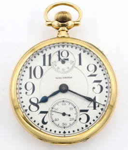 14k AWW Co. Vanguard Railroad Watch: A 14k Gold AWW Co. "Vanguard" Model Railroad watch with UP/DOWN wind indicator. 16 size, 23 j, Adj 5 pos, DR, DMK, GJS, SW, PS, 14 k Gold BWC Co. OF, Porcelain DSD with Arabic numerals marked