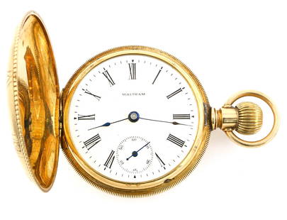 14k Gold AWW Co. Pocket Watch: A 14k Gold AWW Co. 1883 Model Pocket watch. 18 size, 15 j, Adj, DMK, SW, LS, Engraved 14k Gold Keystone HC, Porcelain DSD with Roman numerals marked "American Waltham Watch Co.". Serial #9180953.