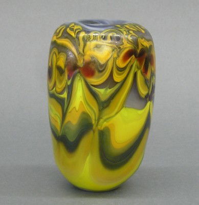 Leon Applebaum vase: Leon Applebaum, born Toledo, Ohio 1945, Art Glass vase. Cylinder form with multi-color pulled iridescent design on a White body. Etched signature "Leon Applebaum '74". Slight wear. 5" high. ESTIMATE $