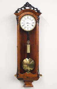 1 Weight Vienna Regulator: A 19th century Vienna Regulator wall clock by W. Schonberg, in Wien. 8-day weight driven time only movement with a two-part porcelain dial, Roman numerals and Bronze piecrust bezel. Biedermeier Period