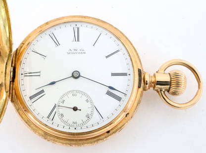 AWW Co. 14k Gold Ladies Watch: An AWW Co. 14k Gold ladies watch. 6 size, 16 j, Adj, DMK, GJS, SW, LS, Fancy Wm. Moir 14k Gold engraved HC, Porcelain SSD with Roman numerals marked "A. W. Co., Waltham", serial #4046011. 58.7 grams t