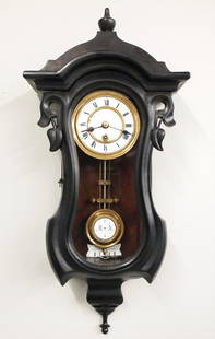 Mini Vienna Regulator: A 19th century Miniature Vienna Regulator wall clock. 8-day spring driven time only movement with a 3 1/4" two-part porcelain dial, Roman numerals and molded Brass bezel and compensating R/A