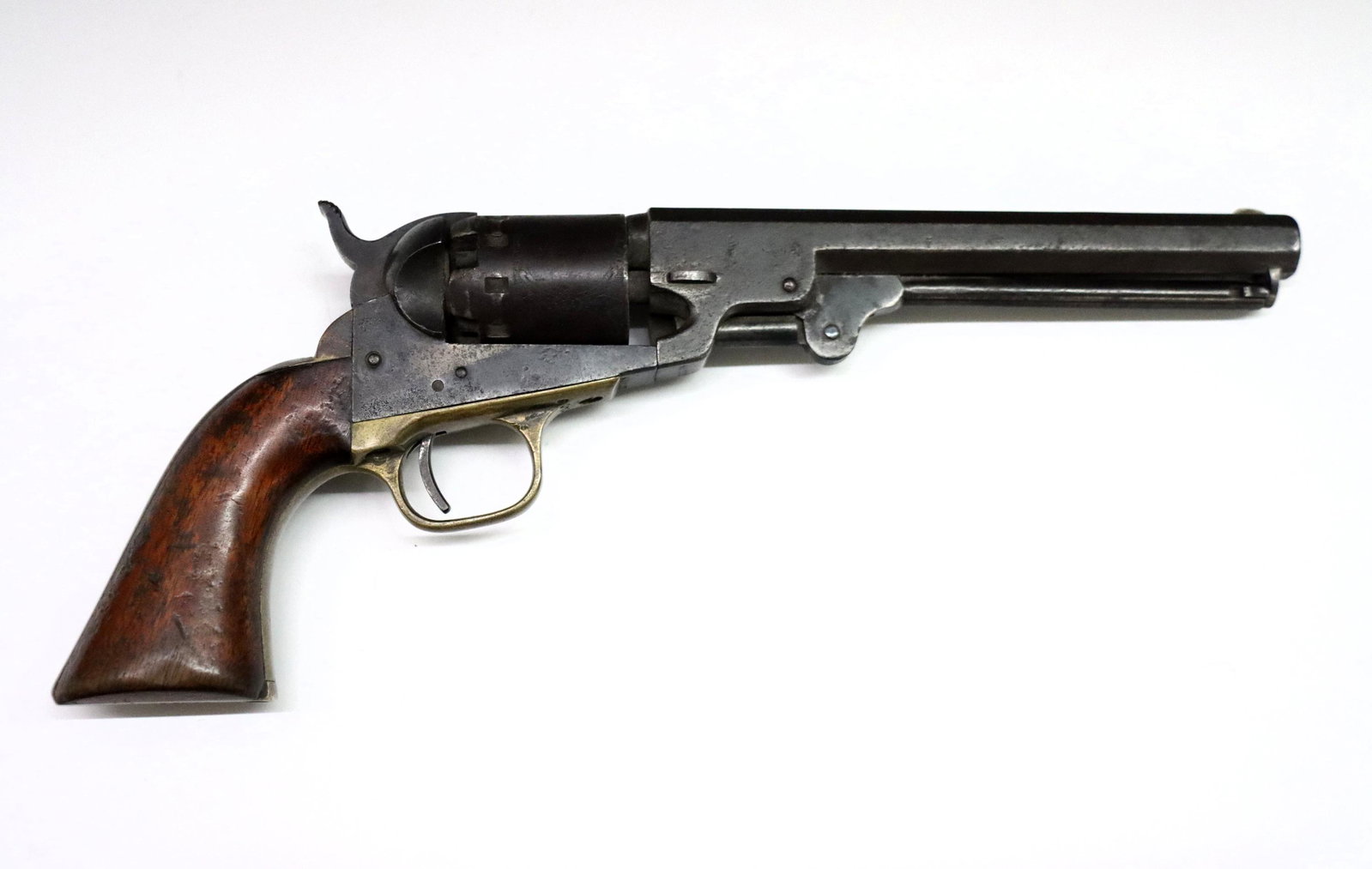 Manhattan Navy Series IV Revolver: A Manhattan Navy Series IV percussion revolver. .36 Caliber, 5 shot single action with engraved cylinder, 6 1/2" octagonal barrel and Walnut grip with Nickeled Brass frame. Serial #70722 on bottom of 