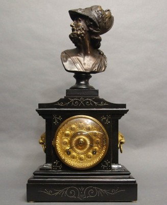 Ansonia mantle clock: A turn of the century Ansonia "La France" model Iron mantle clock with patinated Spelter bust of "Ajax". 8-day time and strike movement. Minor wear, restored finish, minor damage. 21 1/2" high overall