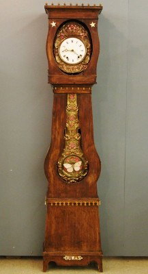 French Farmhouse clock: A 19th century French Farmhouse tall clock. 8-day time and strike Morbier movement with porcelain dial and embossed Brass surround and matching pendulum. Shaped Pine case with painted finish and appli
