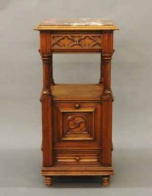 Gothic night stand: A late 19th century Gothic Revival Walnut night stand. Molded top with inset marble above an upper drawer, open shelf lower door and a second drawer on turned feet. Old finish with wear and minor dama