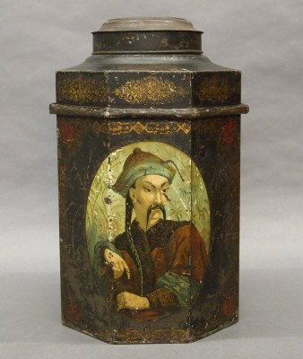 Polychrome Tea tin: A 19th century Tea tin with original polychrome painted finish and portrait of a Chinese Merchant. Octagonal tin paneled body with lift off cover. Wear and minor damage. 16" high. ESTIMATE $100-200