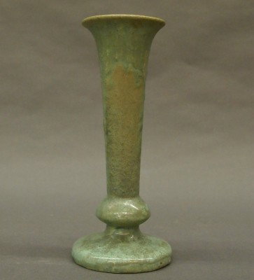 Fulper Pottery vase: A 20th century Fulper Art Pottery vase. Footed form with flared rim in a Cucumber Drip glaze. Stamped vertical "Fulper" mark. Minor surface wear. 9" high. ESTIMATE $100-200