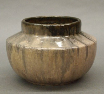 Fulper Prang Pottery vase: A 20th century Fulper Prang Art Pottery vase. Molded bulbous design with sloped shoulder in a Lavender/Black glaze. Stamped vertical "Fulper" mark. Slight surface wear. 4 1/2" high. ESTIMATE $100-200
