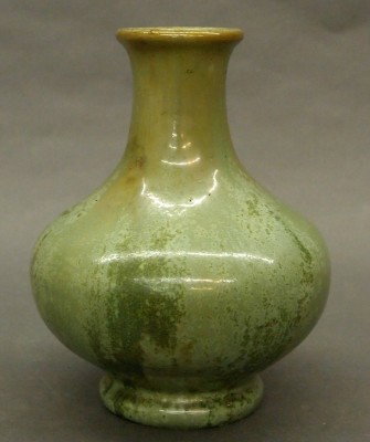Fulper Pottery vase: A 20th century Fulper Art Pottery vase. Baluster form with flared rim in a Cucumber Crystaline glaze. Impressed vertical "Fulper" mark. Slight surface wear. 8" high. ESTIMATE $100-200