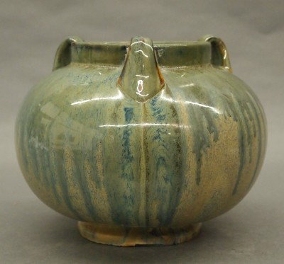 Fulper Pottery vase: A 20th century Fulper Art Pottery vase. Bulbous form with three handles in a Blue/Tan glaze. Impressed "564, #7" mark. Slight surface wear. 7" high. ESTIMATE $100-200
