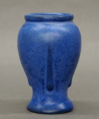 Fulper Pottery vase: A 20th century Fulper Art Pottery vase. Paneled baluster body in a Blue Matte glaze. Impressed horizontal "Fulper" mark. Slight surface wear. 4 1/4" high. ESTIMATE $50-75