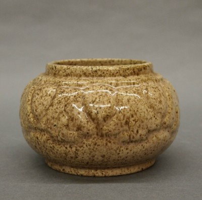 Fulper Pottery bowl: A 20th century Fulper Art Pottery bowl. Molded design in a Brown speckled glaze. Stamped vertical "Fulper" mark. Slight surface wear. 5 1/2" diameter. ESTIMATE $50-75