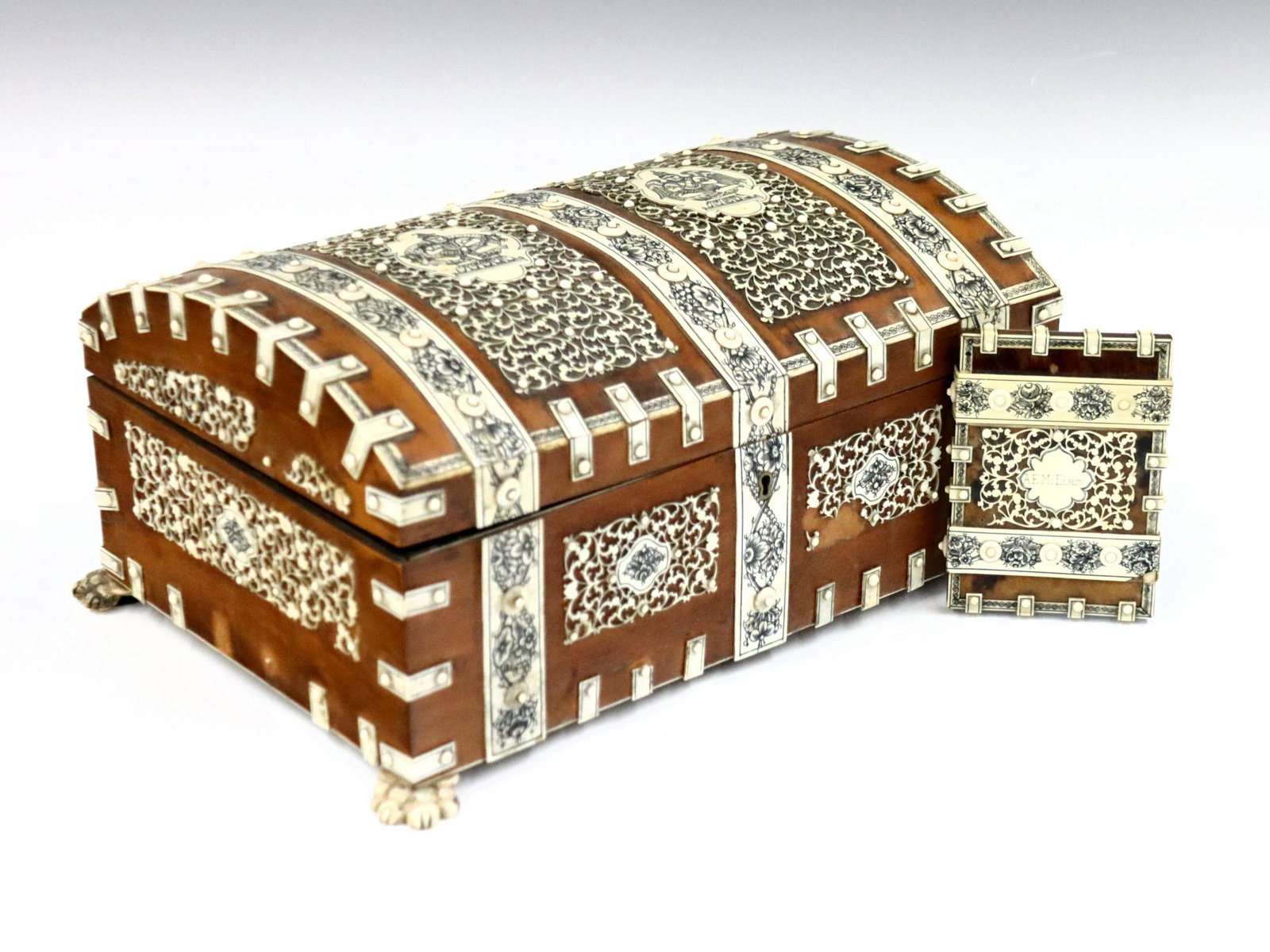 Anglo Indian Inlaid Sewing Box & Card Case: A late 19th century Anglo Indian Raj Period sewing box with accompanying card case. Both Sandalwood and inlaid Bone construction with engraved Bone decoration. Box with hinged top opens to reveal a fi