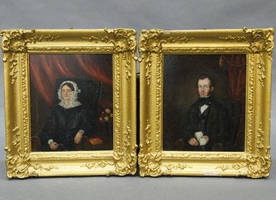 Pr portraits: A pair of 19th century portraits. A Lady and a Gentleman, oil on wooden panels, depicted seated in early Victorian chairs before Red curtains. Minor craquelure, frames repainted. Each image 5 1/2 x 6 