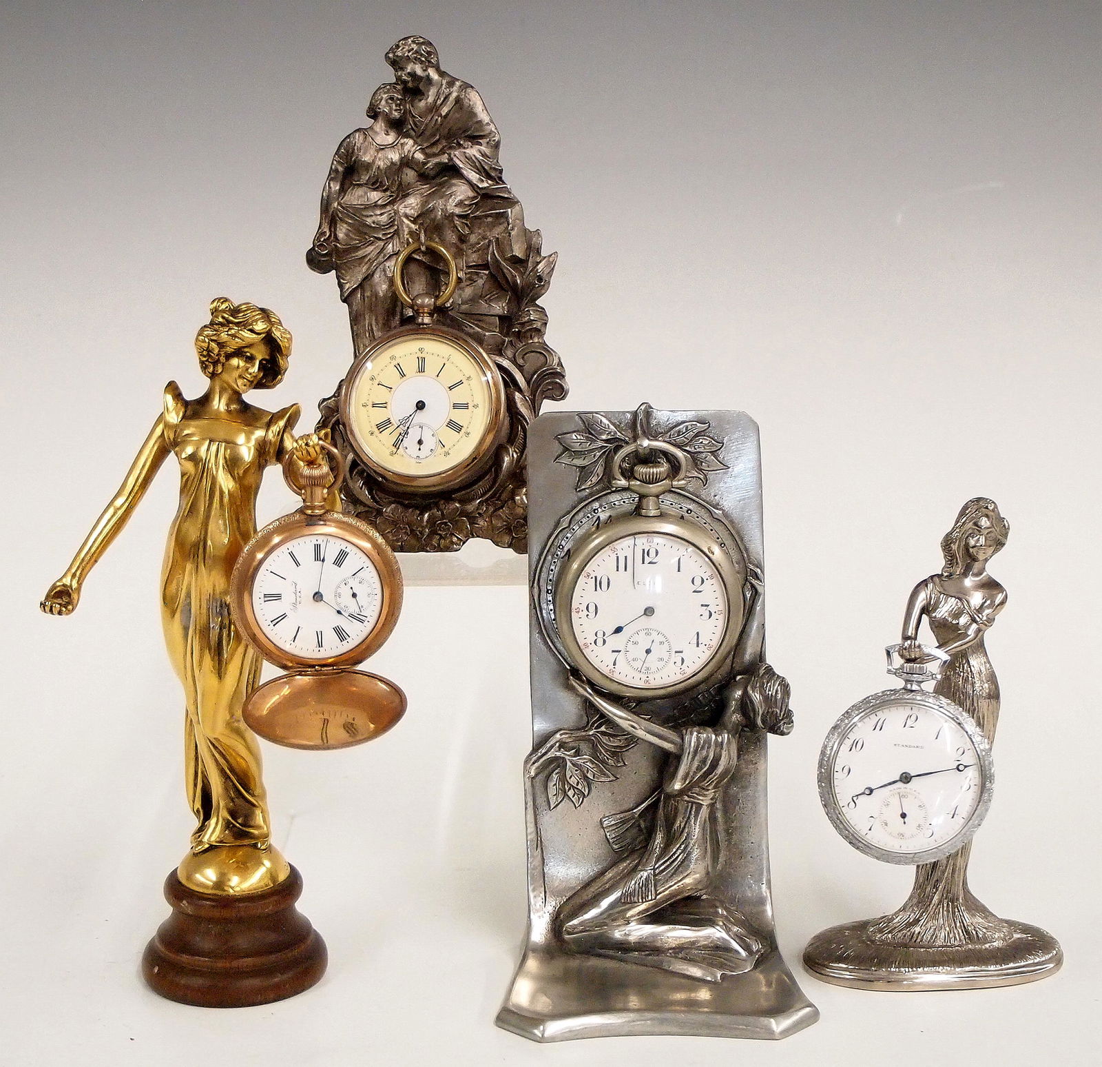 4 Figural Watch Holders (1 of 1)