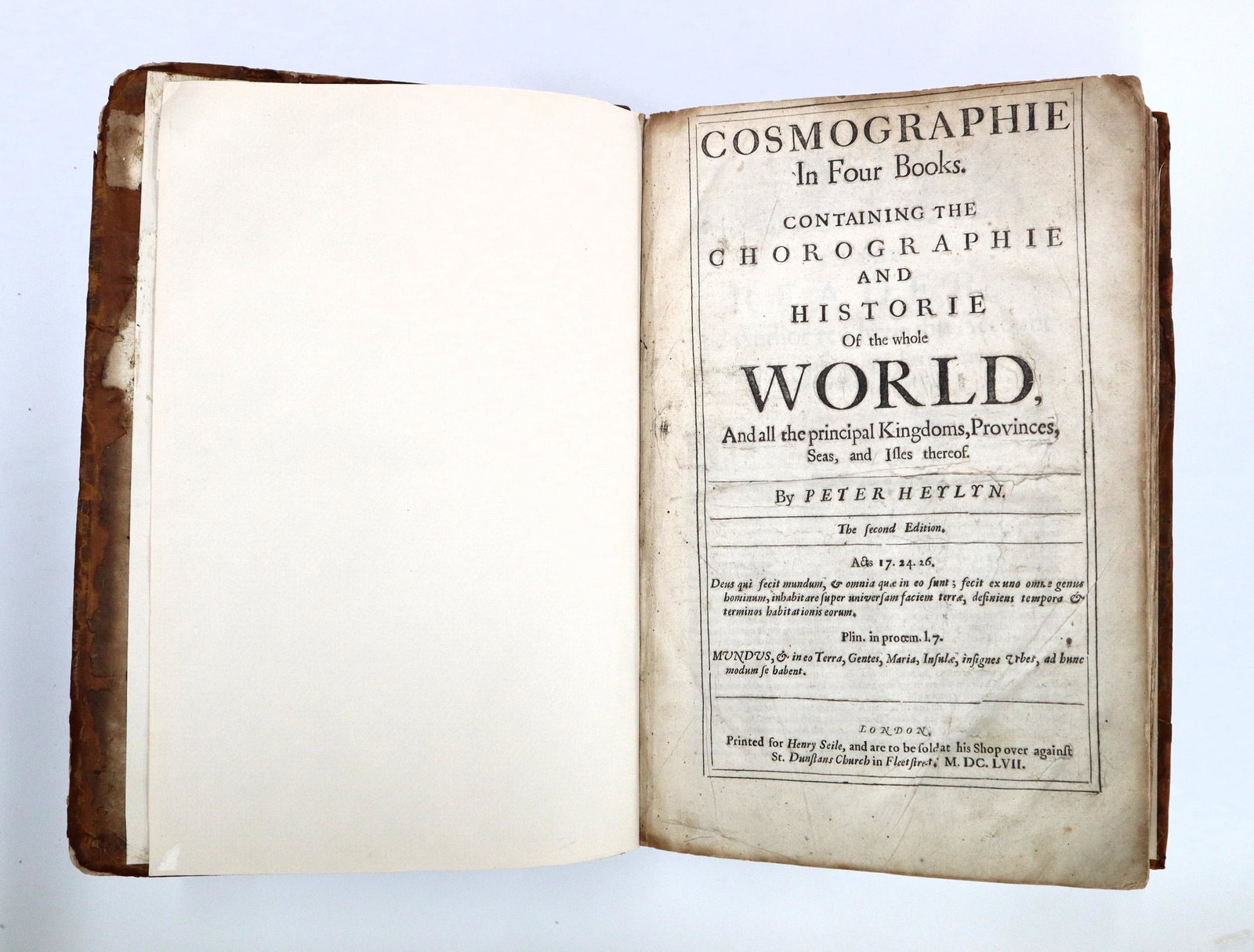 Heylyn Cosmographie in Four Books: Heylyn, Peter. "Cosmographie in Four Books, Containing the Chorographie and Historie of the Whole World" Second Edition. London; Henry Seile, MDCLVII (1657). Full calf with raised bands and sprinkled 