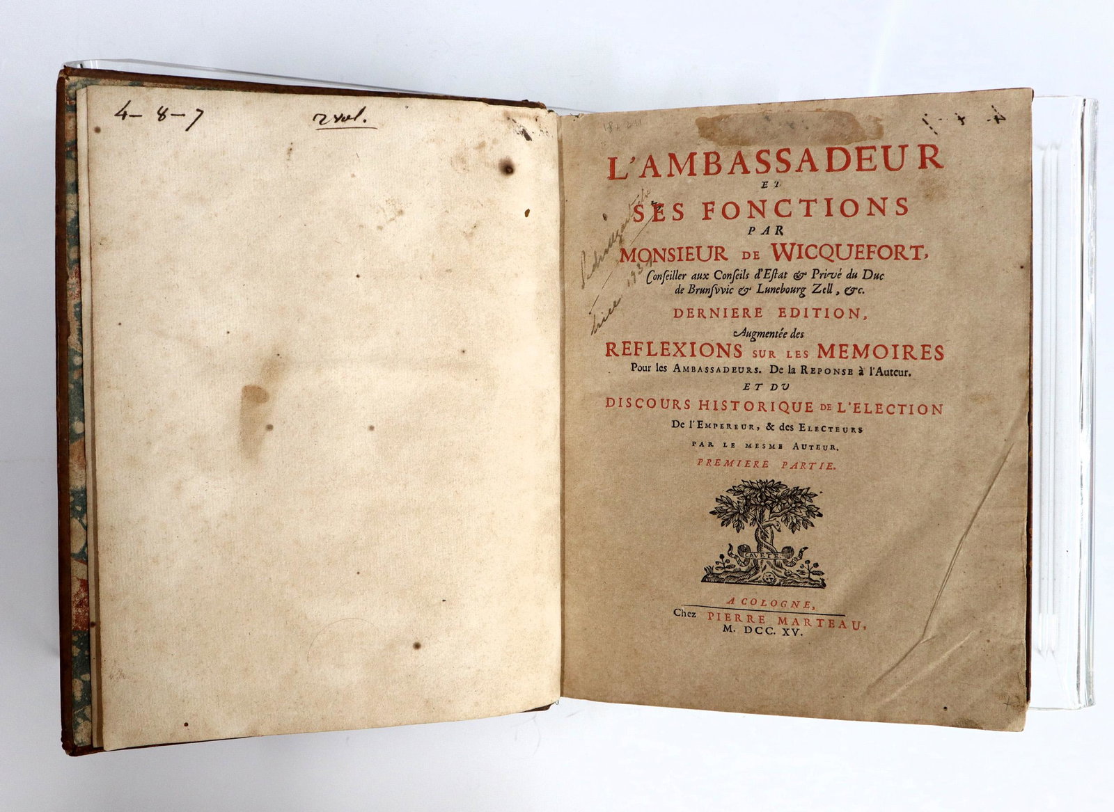 Wicquefort L'Ambassaduer et ses Fonctions Vol I-II: Wicquefort, Abraham. "L'Ambassaduer et ses Fonctions" Volumes I & II. Cologne; Pierre Marteau, MDCCXV (1715). Full speckled calf with raised bands and sprinkled edges, 4to (10" high). Wear and damage,