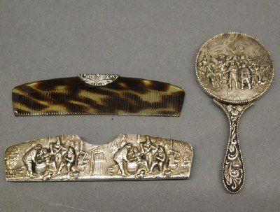 Silver comb and mirror: A turn of the century .900 Silver comb and pocket mirror with Repousse scenic designs. Marked "S + F" possibly by Spier & Forshiem, New York. Minor wear. Up to 5" long. ESTIMATE $100-150