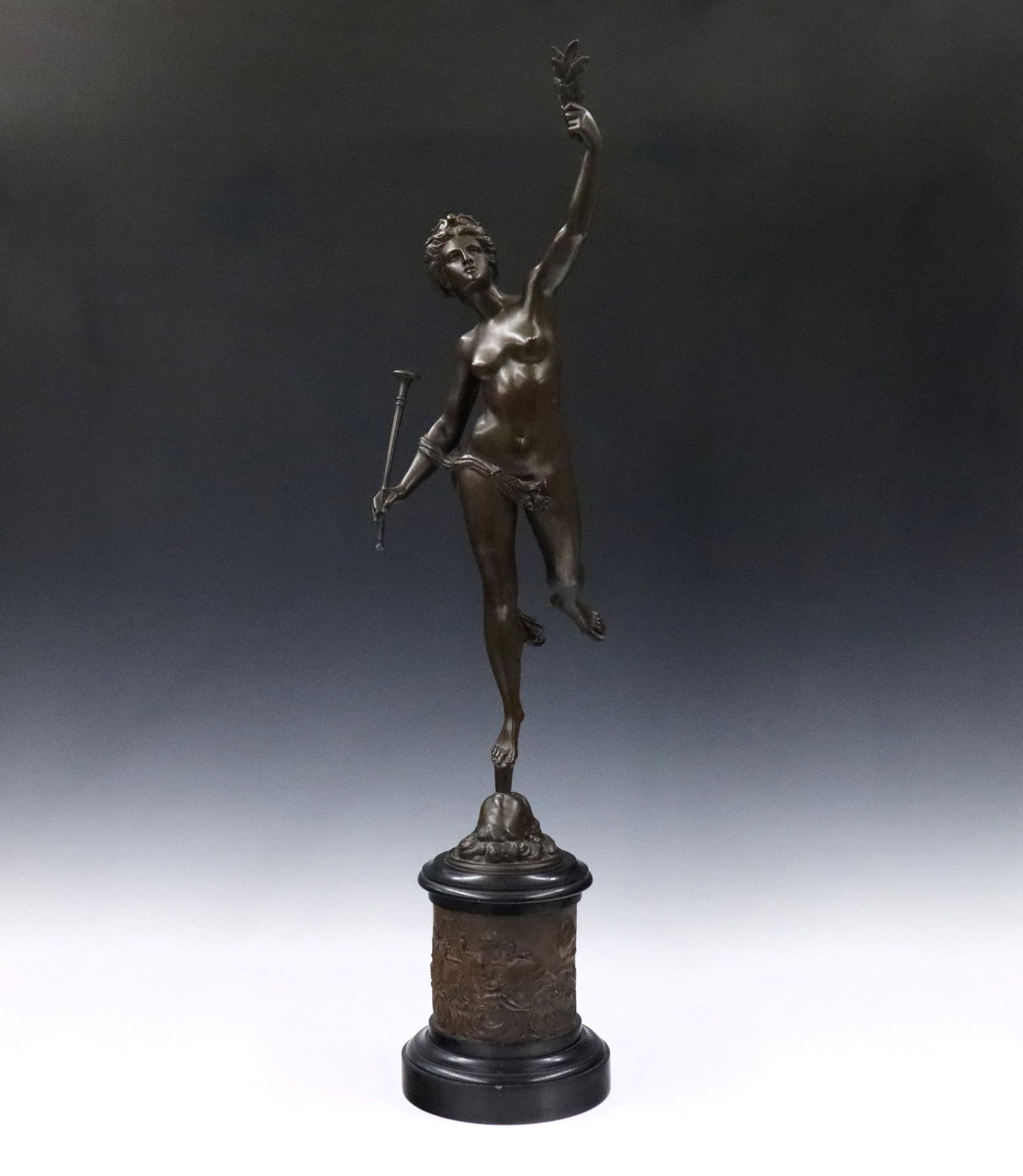 After Giambologna Bronze Fortuna Figure: A 19th century Bronze figure of Fortuna after Giambologna (Flemish/Italian, 1529-1608). Depicts the Greek goddess balancing on a gust of wind from the mouth of Zephyr with horn and laurel leaves, pres