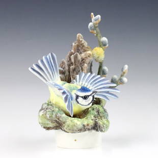 Royal Worcester Blue Tit Figure: A 1960's Royal Worcester "Blue Tit and Pussy Willow" porcelain figure designed by Dorothy Dougherty. Printed maker's marks, titled and dated "1964" with printed artist signature at underside. Good con