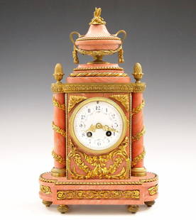 French Mantel Clock By A D Mougin: A late 19th century French Louis XVI Style mantel clock by A. D. Mougin, Paris. 8-day time and strike movement with convex porcelain dial, Arabic numerals, hand painted floral swags and fancy Gilded