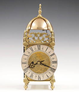 Mini English Lantern Clock: A 19th century Miniature English Lantern clock. 8-day spring driven fusee movement with passing strike, engraved Brass dial with Silvered chapter ring and Roman numerals signed "Jerome Gazeut, St