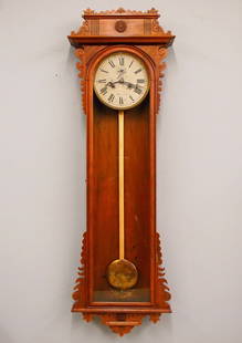 E N Welch Regulator #11 Wall Clock: A late 19th century E. N. Welch "Regulator #11" model wall clock. 30-day dual spring time only movement with painted metal dial, Roman numerals and subsidiary seconds. Walnut Eastlake Period case with