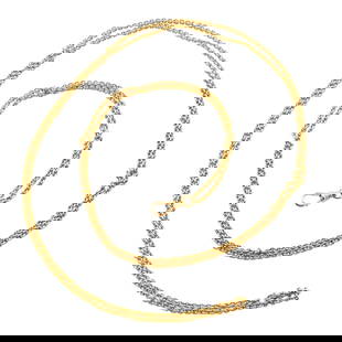 10k Gold Watch Chain: A 10k Gold watch chain. 24.2 grams total weight. Minor wear. 50" long overall. ESTIMATE $1,000-1,500