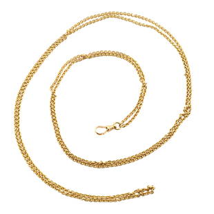 10k Gold Watch Chain: A 10k Gold watch chain. 24.2 grams total weight. Minor wear. 50" long overall. ESTIMATE $1,000-1,500