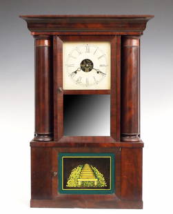 William Gilbert Shelf Clock: A mid 19th century William Gilbert Double Decker hollow column shelf clock. 30-hr Brass time and strike movement with painted metal dial and Roman numerals. Mahogany case with a molded cornice, two pa